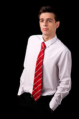 Image showing Portrait of a young business man isolated on black background