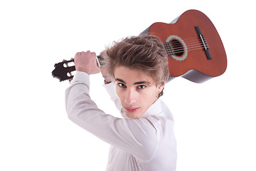 Image showing Handsome and angry young man musician guitar player portrait on white