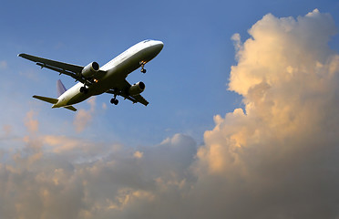 Image showing Airplane above the clouds