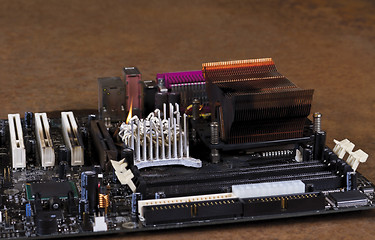 Image showing molten cooling element on computer main board