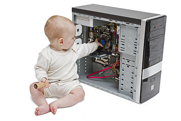 Image showing young child working on open computer