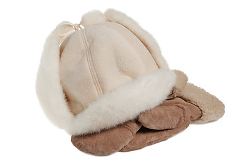 Image showing women's winter fur hat and mittens, isolated on white 