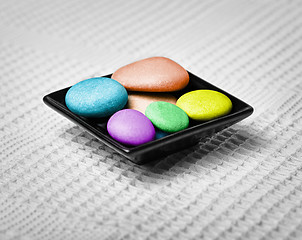 Image showing Color pebbles in a bowl - spa