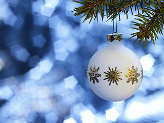 Image showing white Christmas bauble in blue back