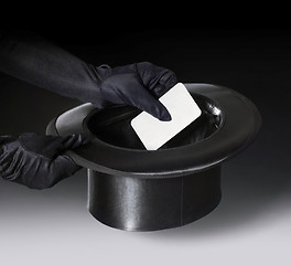 Image showing magic stovepipe hat and gloved hands