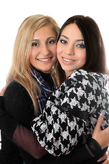 Image showing Portrait of two attractive girls embracing