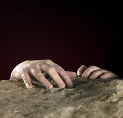 Image showing hands on stone surface