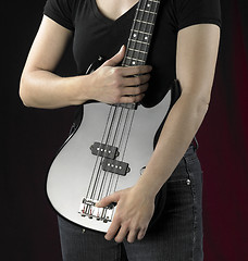 Image showing woman with bass guitar