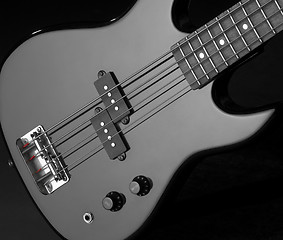 Image showing black bass guitar detail