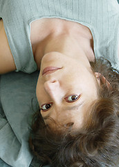 Image showing Attractive woman lying upside down