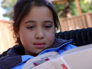 Image showing Cute girl reading a book