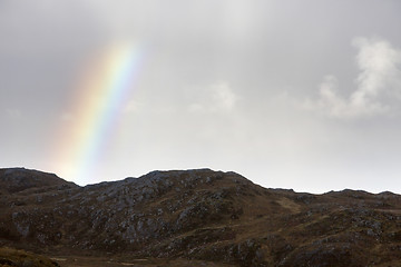 Image showing scottish scenery with rainbow and clouds