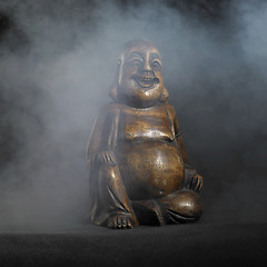 Image showing Buddha sculpture in dark back