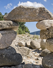 Image showing sunny illuminated pebble archway