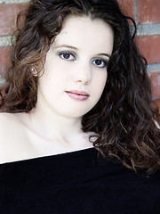 Image showing Beautiful girl against brick wall