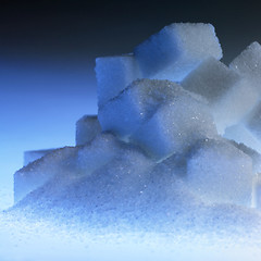 Image showing blue illuminated lump sugar pile