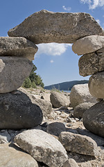 Image showing pebble archway at summer time