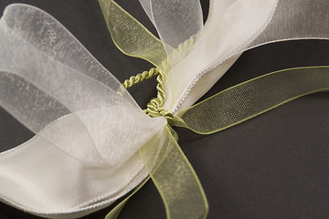 Image showing decorative white and green bow