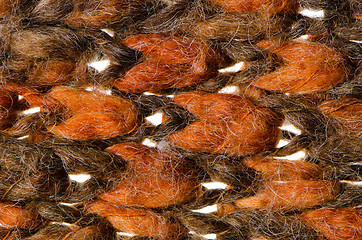 Image showing Orange and green knitted wool