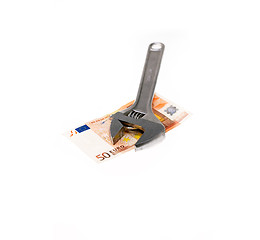 Image showing wrench and euro isolated on white