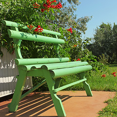 Image showing Green wooden bench