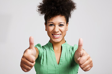 Image showing Beautiful woman with thumbs up