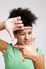 Image showing Woman making a frame with fingers