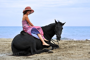 Image showing woman and  horse on the beach