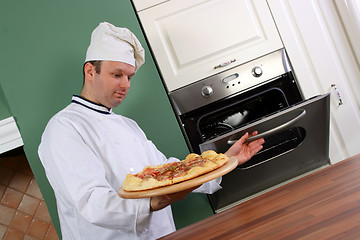 Image showing Chef and pizza