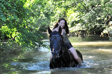 Image showing woman and  horse in the river