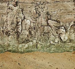 Image showing Granite rock on a sandy beach