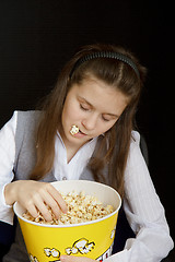 Image showing girl asleep in a movie theater