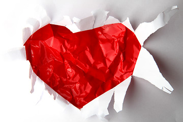 Image showing red heart in the white paper