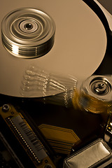 Image showing hard disk drive in motion - four