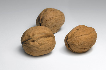 Image showing three walnuts