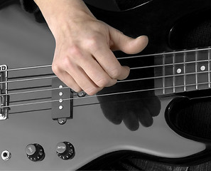 Image showing hand and electric bass