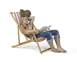 Image showing relaxing girl in canvas chair