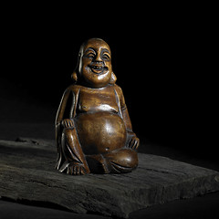 Image showing Buddha sculpture in dark back