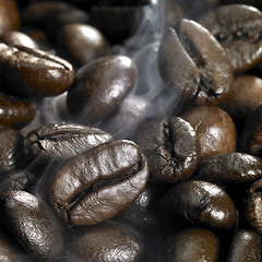 Image showing roasted coffee beans and smoke