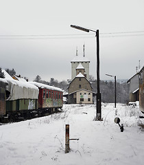 Image showing old railway cars and station