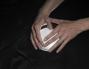 Image showing crystal ball and hands around