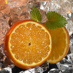 Image showing sliced oranges and ice cubes