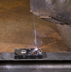 Image showing welding a hard disk