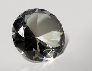 Image showing diamond in light back