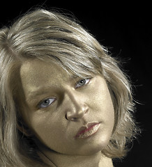 Image showing young woman with golden face