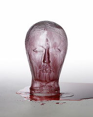 Image showing bloody glass head