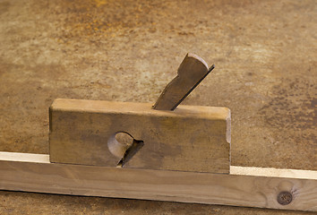 Image showing planer on wooden plank