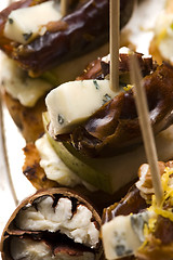 Image showing Appetizer Plate with Dactyl, Pecan nuts and Cheese