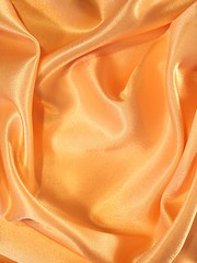 Image showing Smooth elegant gold silk as background