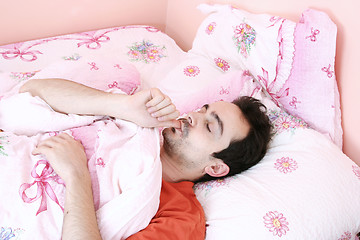 Image showing Young man sleeping .